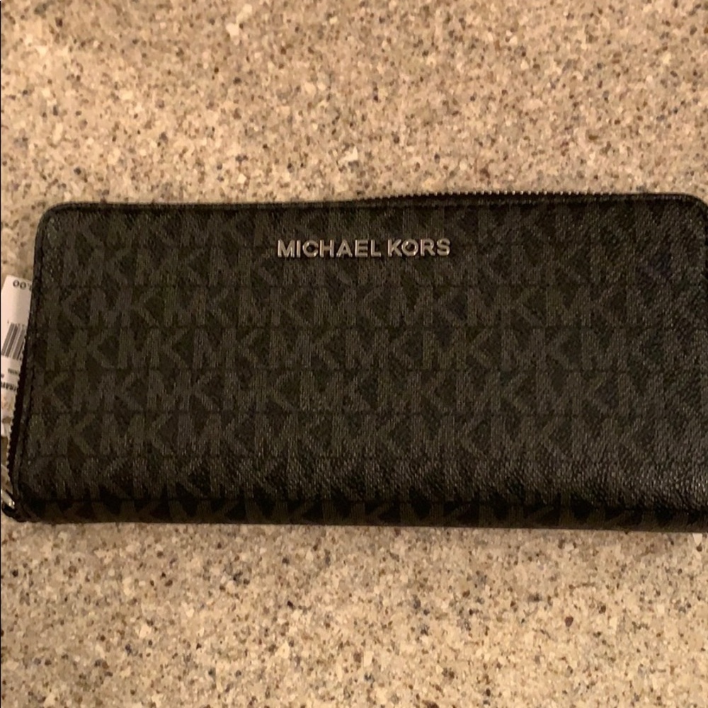 Michael Kors black wallet.